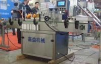 洗潔精貼標機與潤滑油側貼貼標機——濟南嘉益貼標機廠產品解析